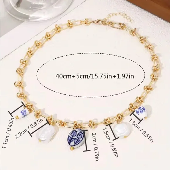 Anthropologe Gold and Blue Charm Necklace - Picture 5 of 8